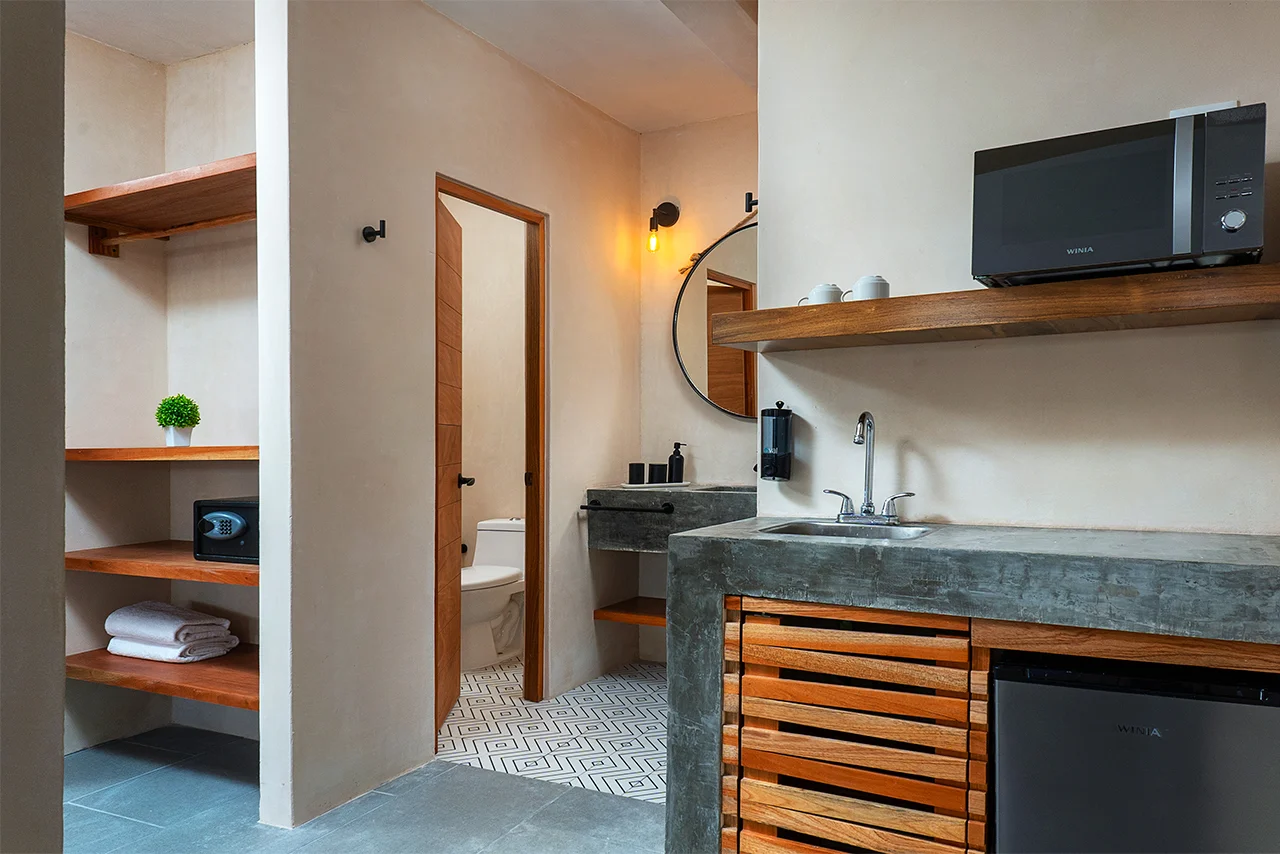 Illacozumel-king-standard-cocineta-closet-ingreso-bano-perspectiva1-1280-x-854